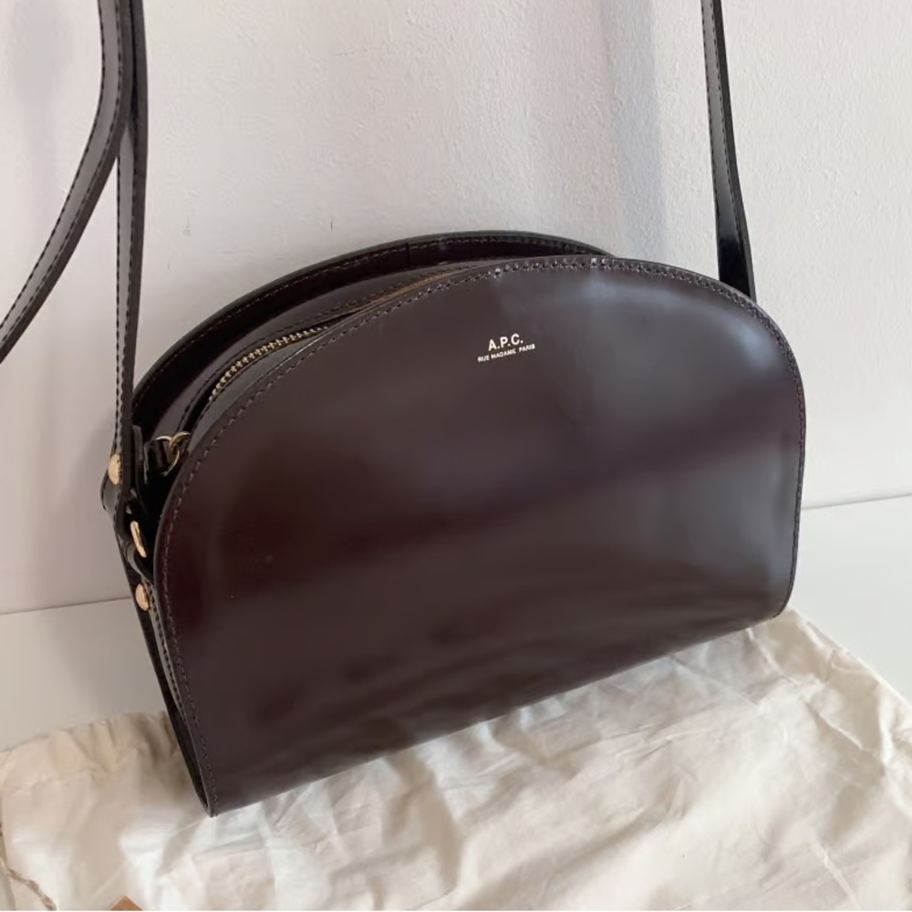 A.P.C. Demi-Lune crossbody bag in brown patent leather